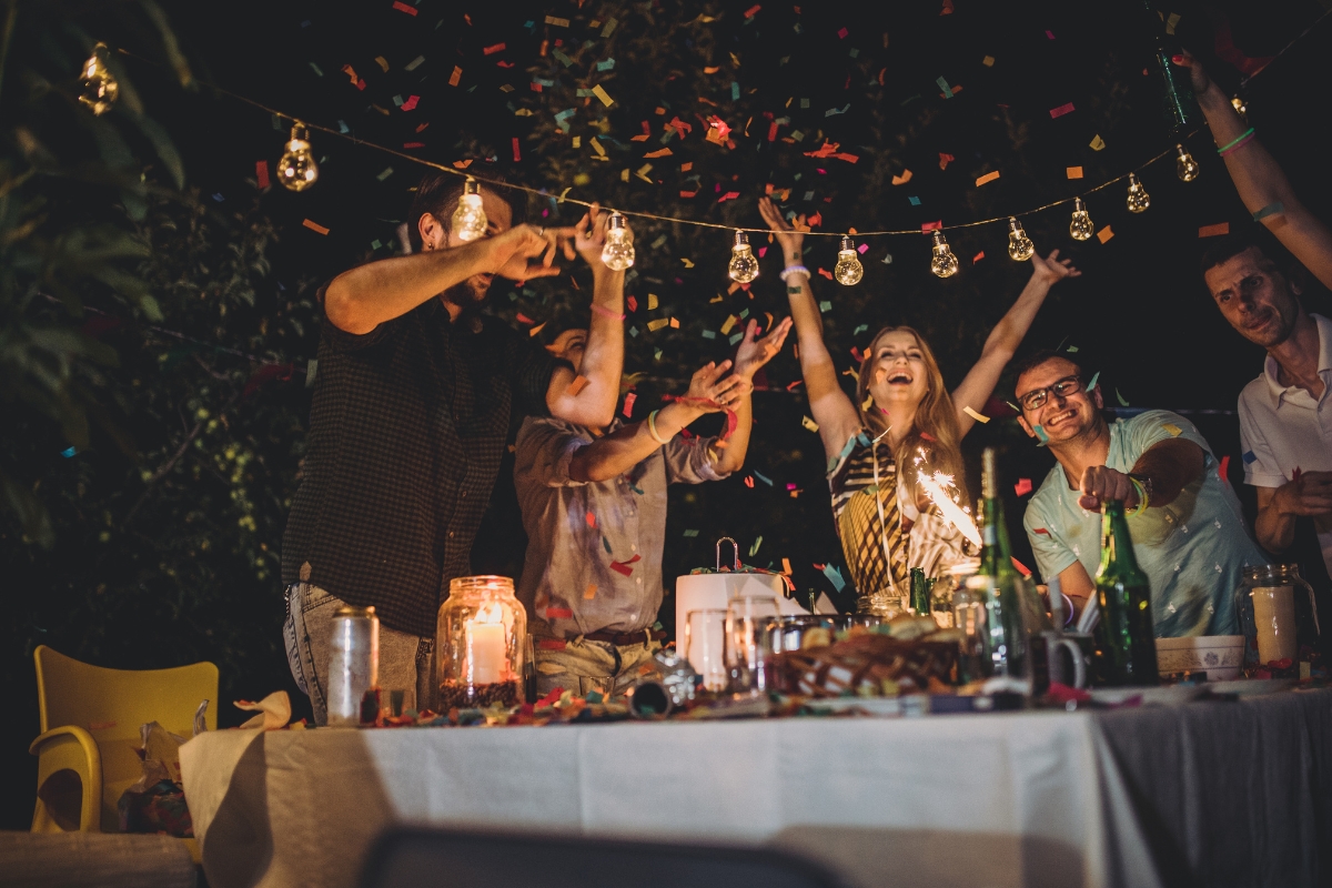 A group of friends celebrating at a fall party.