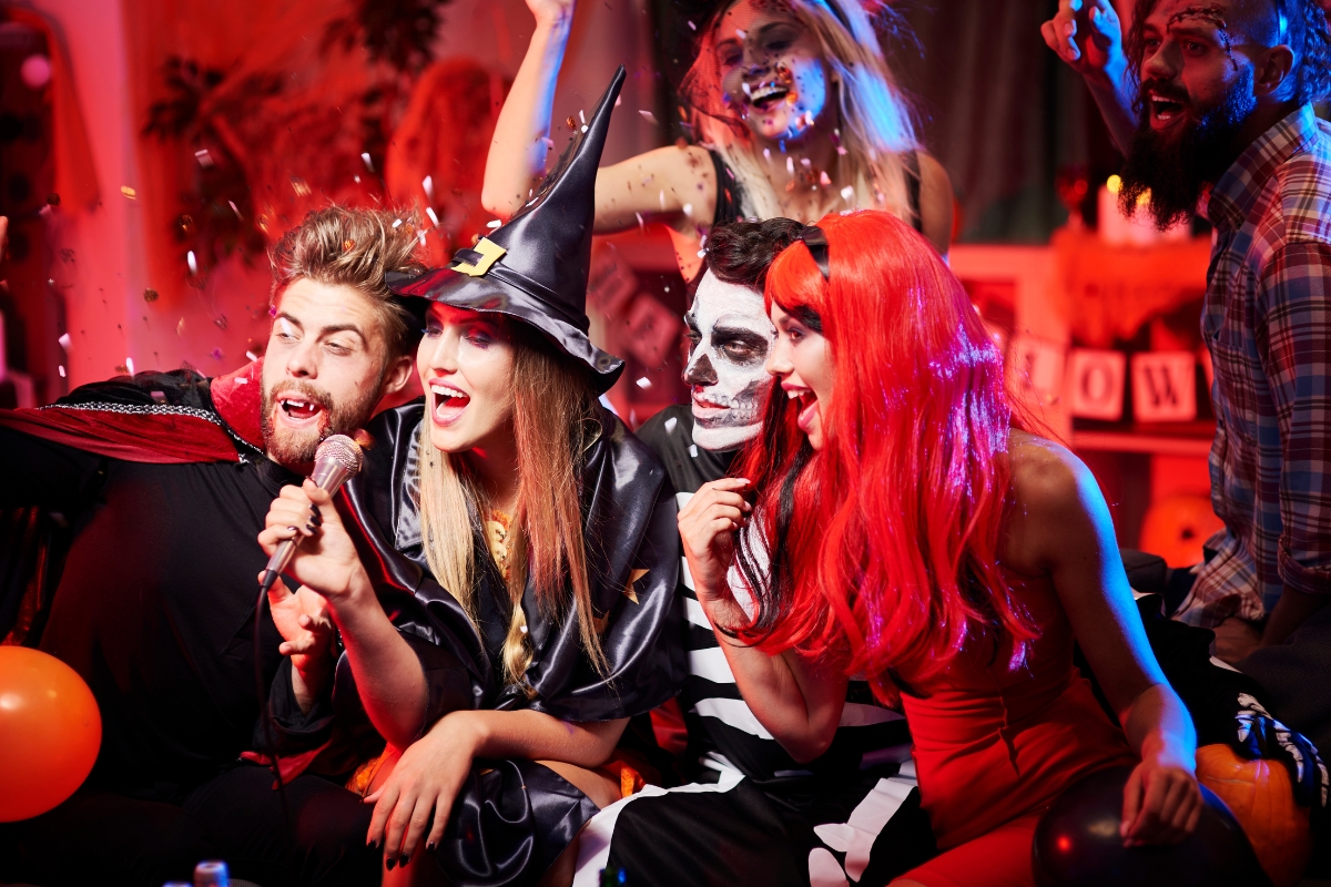 A group of people dressed up in spooky halloween costumes.