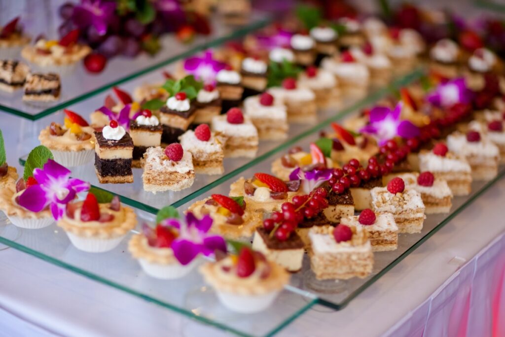 A tempting buffet of desserts beautifully displayed on a table.