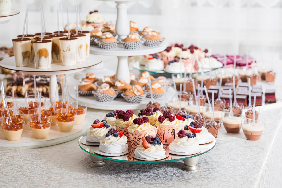 A dessert catering table for parties with an abundant variety of desserts.