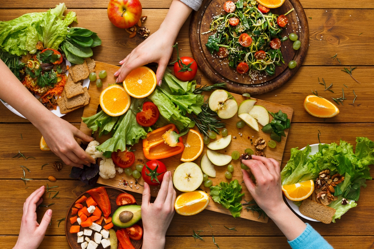 A group of people preparing plant-based catering.