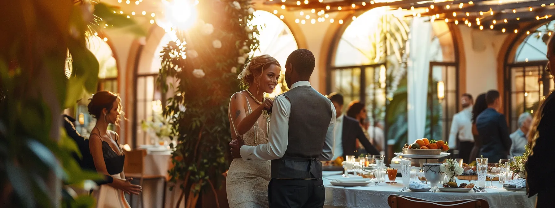 a bride and groom discussing their seasonal wedding menu with a caterer in a beautifully decorated venue.